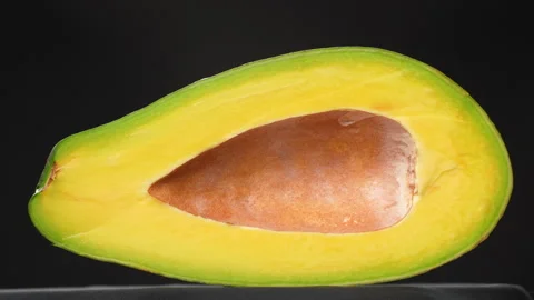 Static Close Up Fresh Avocado Half Pitted Without Seed White Background 4K Stock Footage 322088462