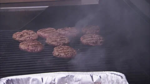 A Static close up of hamburgers cooking on grill Video stock 155449643