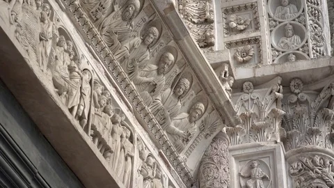 Static close up of medieval sculpture on door surround of the Pisa Baptistery Stock Footage 83632811