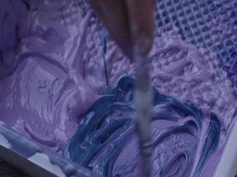 Static Close Up of Paint Mixed By Paintbrush Stock Footage 85061202