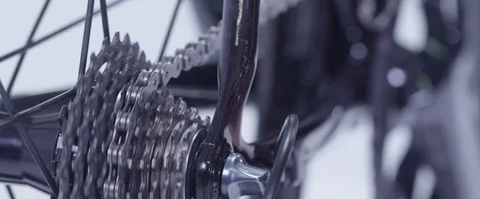 Static Close Up sequence shots of bicycle chains and petals starting up Stock Footage 85290555