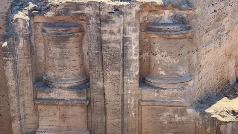 Static close up shot of ancient ruins architectural details on rock wall Stock Footage 336333953