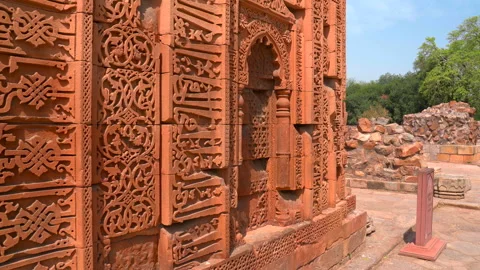 Static close up shot of Arabic calligraphy and geometric carvings on the red Stock Footage 342270660