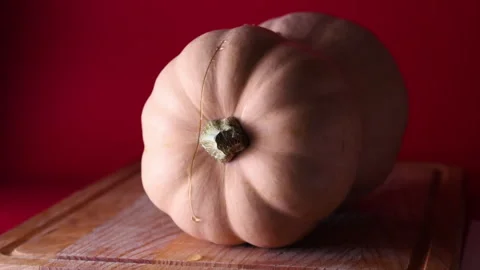 Static close-up shot of a butternut squash partially cut in half from the s.. Stock Footage 319785970