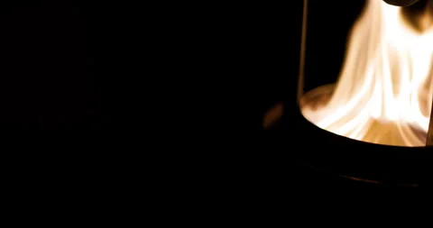 Static close-up of a Solo Stove Mesa XL--with heat deflector--with bright Stock Footage 322566252