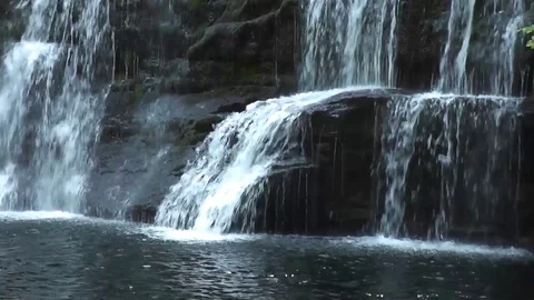 Static close-up of waterfall spilling into pool (Sgwd y Pannwr, Wales) Stock Footage 92576565