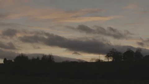 Static Clouds Passing English Countryside Farmland Dusk Electricity Stock-Footage 320114137