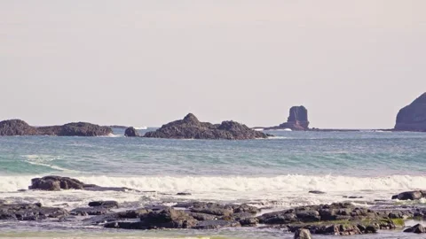 Static Coastal Waves Crashing on Rugged Volcanic Shoreline Video stock 317235888