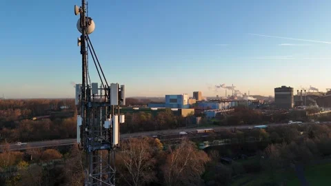 Static dawn shot of telecom tower by motorway Stock Footage 331206745