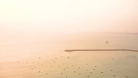 Static drone shot of the ocean with calm waves  of Gawader, Pakistan . (6) Stock Footage 284444118