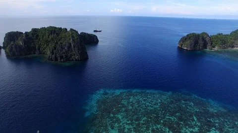 Static Drone Shot of a Speed Boat in the Tropics Stock Footage 96386597