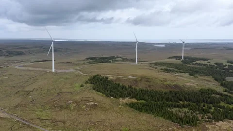 Static drone shot of three wind turbines on the Hebrides Stock Footage 327830990