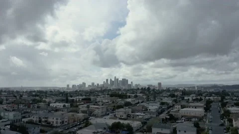 Static Drone tilt to Downtown Los Angeles in distance with cloudy sky Shot 4K Stock Footage 150201826