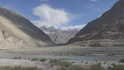 Static Drone Timelapse of Ladakh Mountain Peaks with Clouds Drifting Over the Stock Footage 334410679