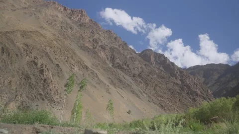 Static Drone Timelapse of Ladakh Mountains with Clouds Moving Over the Peaks Stock-Footage 334415652