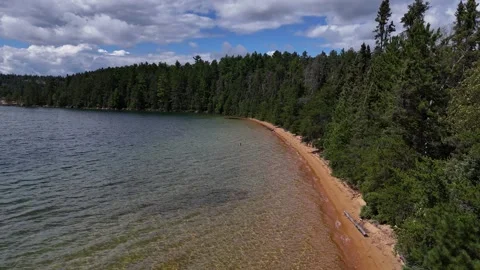 Static Drone View Parallel To Canadian Shield Beach Ontario Summer Stock Footage 345096599