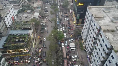 Static Drone View of Traffic on Zoo Road with Rooftop Restaurant in Dhaka Video stock 327620322