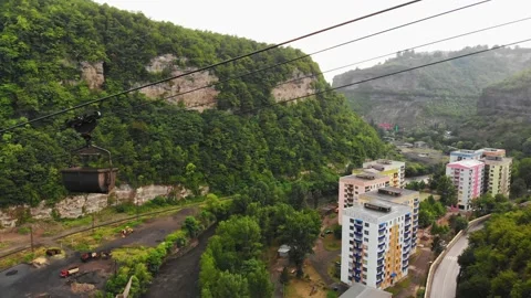 Static drone view trams with mine load carried on cables in Chiatura mining c Stock-Footage 157974808