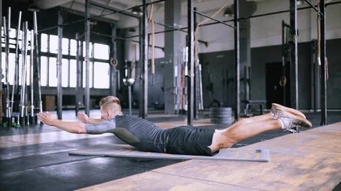 Static exercise for strengthening the muscles of the back. Stock Footage 112330428