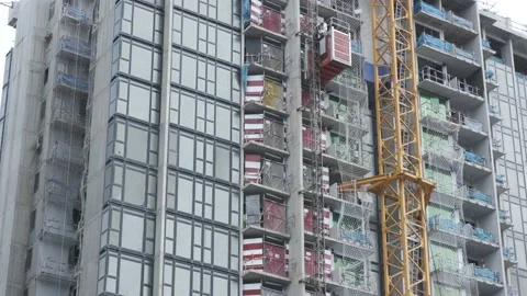 Static Footage Of Condominium Construction Site, Site Lift Descending Vídeo Stock 146762531