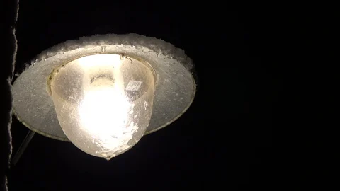 Static footage of outside lamp and dark black background 4k Stock Footage 86729191