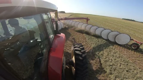 Static GoPro - Rake, Raking up Alfalfa, Lens Flare (5) Stock Footage 221861727