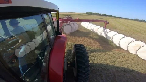 Static GoPro - Tractor and Rake Turning Around Video stock 221861839