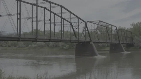 Static Hand Held Shot of Old Foot Bridge in a Small Town Stock Footage 235243434