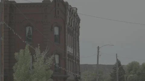 Static Hand Held Shot of Old Western Building in a Small Town Stock Footage 236175609