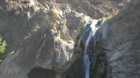 Static Handheld Wide Shot of a Waterfall at Paradise Falls Stock Footage 217493857