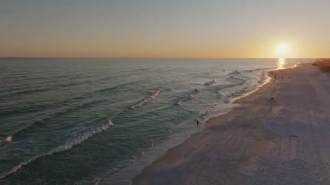 Static high aerial drone shot of sunset on Pensacola beach at sunset waves Stock Footage 302416090