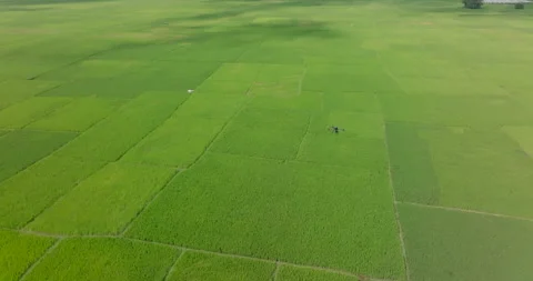 Static hovering drone shot over Koshi Nepal capturing two drones flying above Stock Footage 337393069