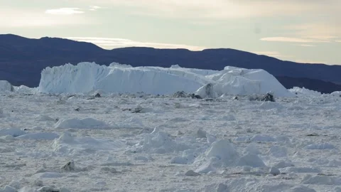 Static Iceberg Amid Dense Ice in Ilulissat Icefjord Greenland 스톡 동영상 345545118