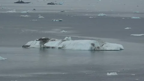 Static Iceberg Surrounded by Floating Ice in Ilulissat Greenland 库存影片 345578087