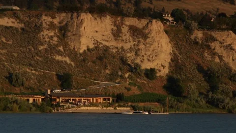 An static lake with a house Stock Footage 99994723