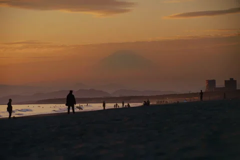 Static long-lens view of Mount Fuji during sunset Stock Footage 321780802