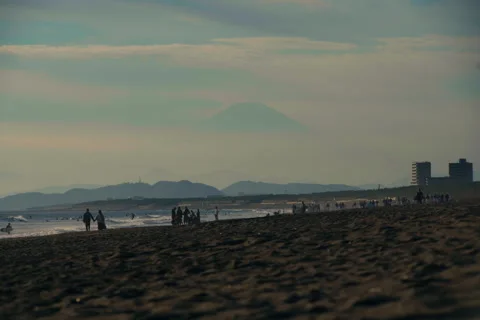 Static long-lens view of Mount Fuji during sunset Stock Footage 321781062