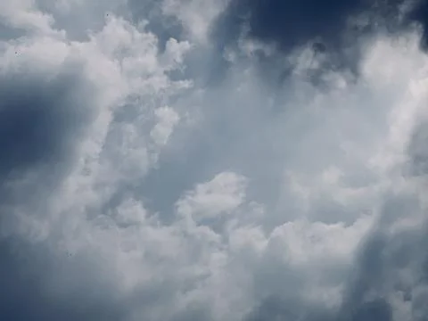 Static Low Angle Shot of Dramatic Dark Storm Clouds in Sky Stock Photos