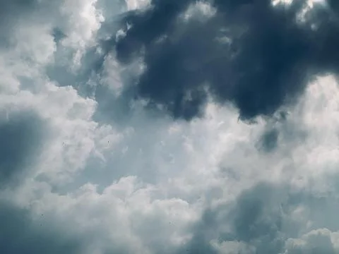 Static Low Angle Shot of Dramatic Dark Storm Clouds in Sky Stock Photos