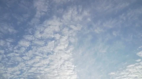 Static low angle view of textured altocumulus clouds in blue sky Stock Footage 337672829