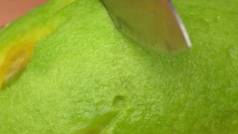 Static Macro Close Up Knife Slicing Fresh Green Avocado Texture 4K Stock Footage 322084855
