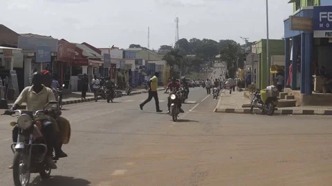 Static medium-long shot of busy Ugandan intersection Stock Footage 81749107