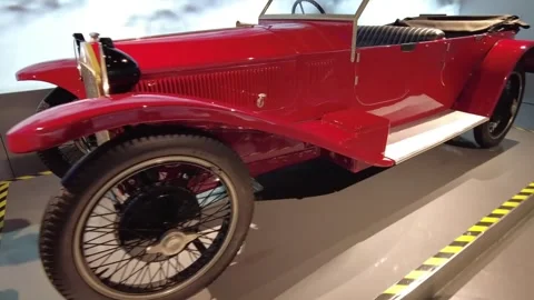 Static medium shot of 1924 Lancia Lambda Italian vintage automobile Stock Footage 338285668