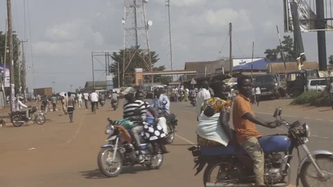 Static medium shot of busy Ugandan street Stock Footage 81749114