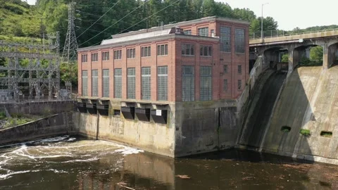 Static over water hydroelectric powerhouse, water discharge, substation-aerial Stock Footage 160926166