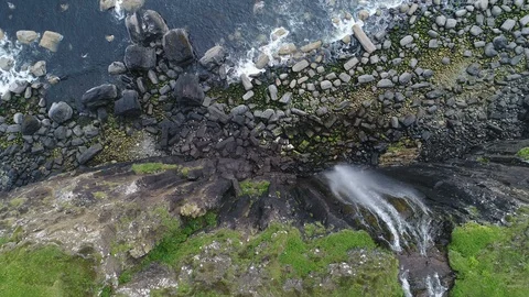 Static overhead drone shot of beautiful Mealt Falls waterfall in Scotland Stock-Footage 98958290