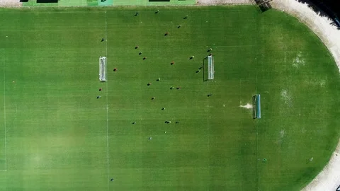 A static overhead shot of a bustling soccer field full of activity communit.. Stock-Footage 314595865