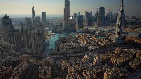 Static pan up from Downtown Dubai to top of Burj Khalifa at 150m. Stock Footage 98938609