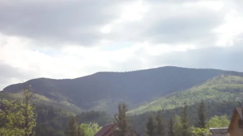 Static relaxing view on mountains. Beautiful view of green mountains. Clouds at  Video stock 131057010