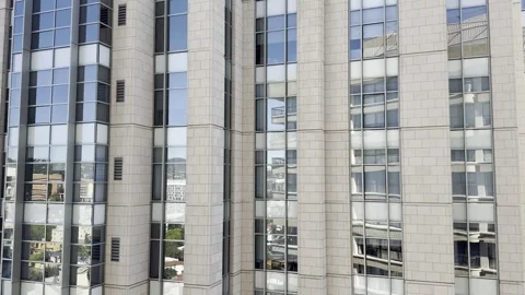Static Shot Across Modern High-Rise Glass Facade in Westwood Stock Footage 329394717